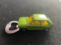 VW Polo Flaschenöffner Upcycling aus bespielten Spielzeugauto